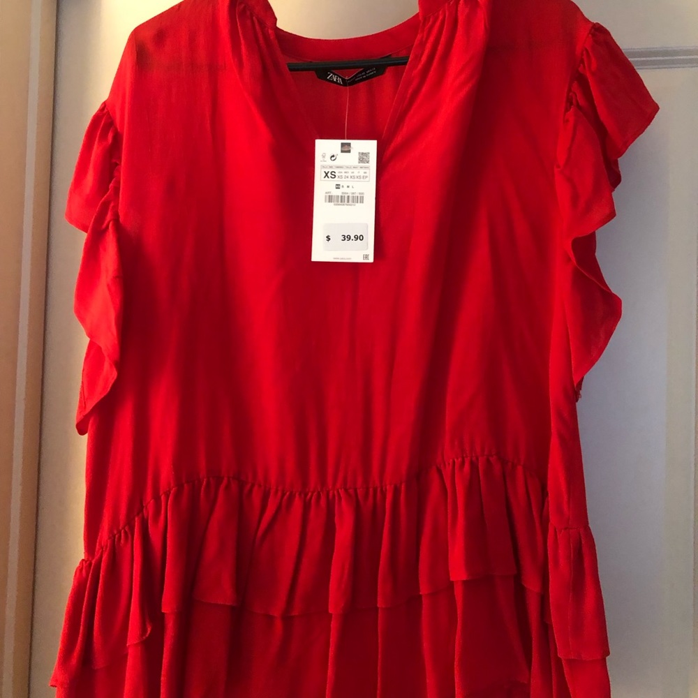Red tunic blouse
